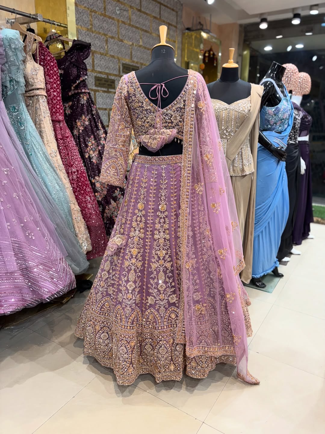 Lavender Embroidered Lehenga Choli with Golden Threadwork & Net Dupatta – Wedding & Festive Wear